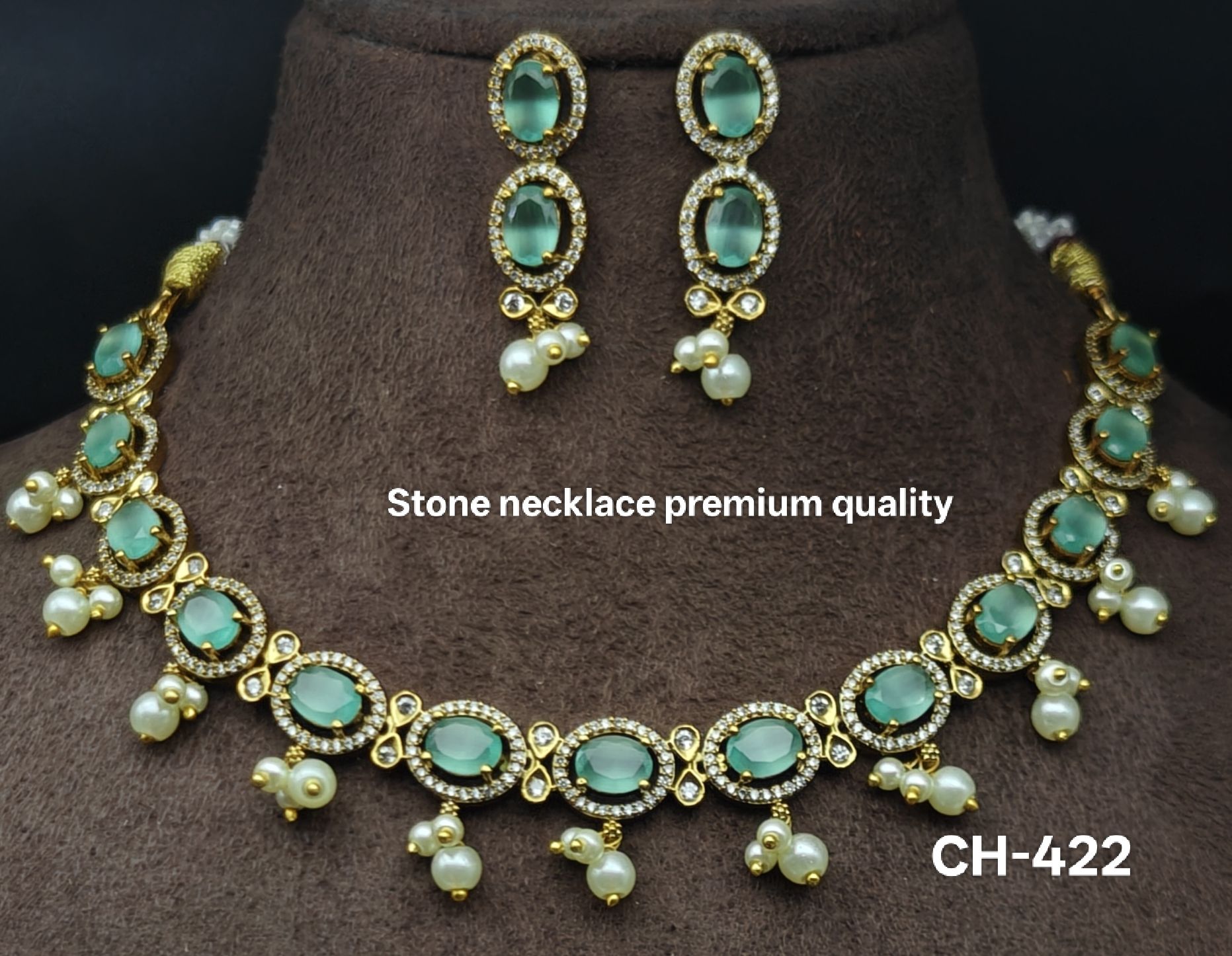 Stone with pearl necklace