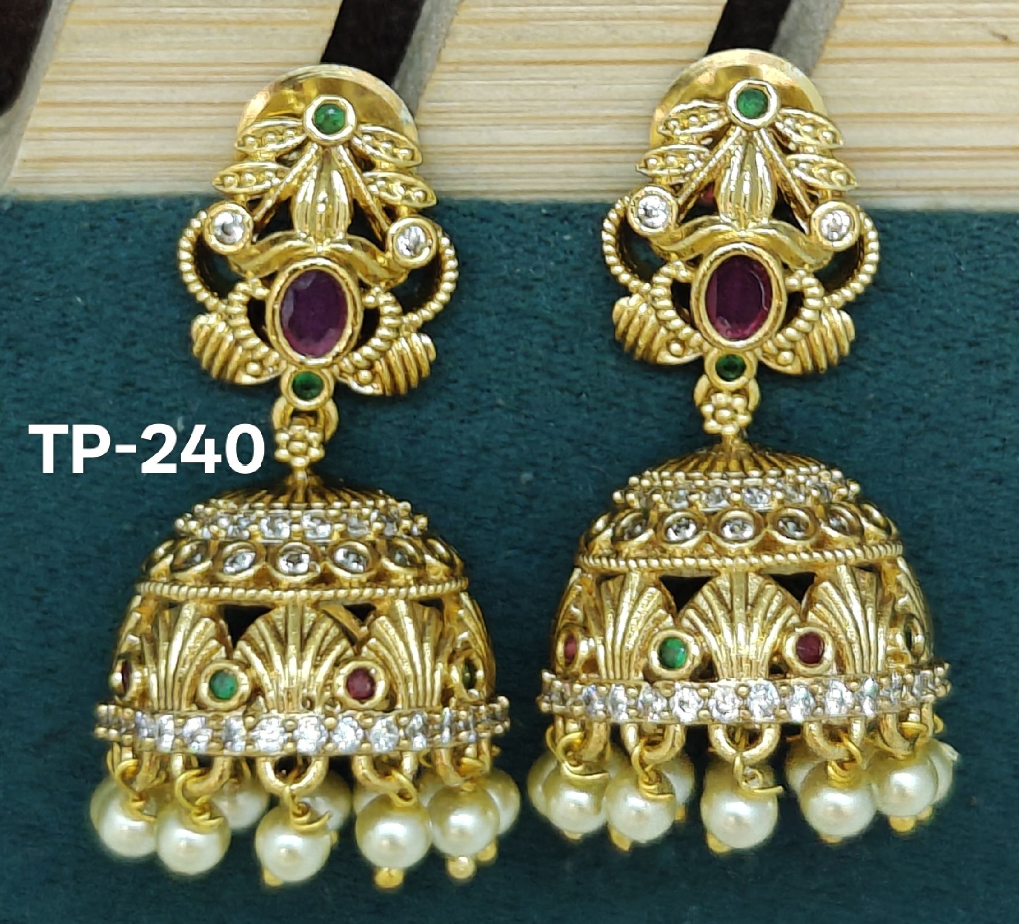 gold polish jhumki